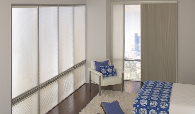 Cell shades are another choice to reflect a minimalist design. Cellular shades in a minimalistic apartment.