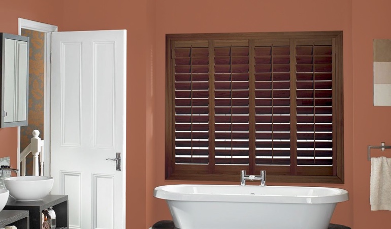 Put old paint to excellent use and give your living space a new life. Plantation shutters in a bathroom